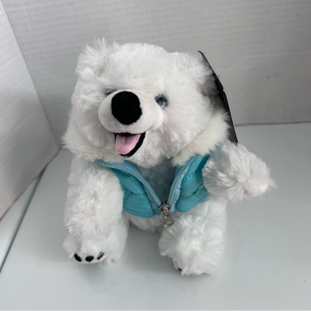 White Polar Bear plush with blue removable vest